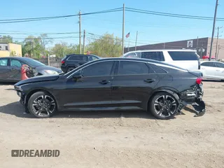 2023 Kia K5 GT-Line z VIN 5XXG64J22PG186976, wystawiony jako IAAI lot #42241886 z przebiegiem 39 502 mil mil oraz . Historia ofert i sprzedaży dostępna na DreamBid. Obrazek 14.