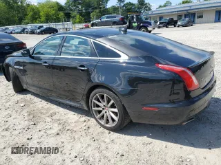 2016 Jaguar XJ R-Sport z VIN SAJWJ1CD8G8V95608, wystawiony jako Copart lot #59103615 z przebiegiem 119 066 mil mil oraz Szkoda całkowita • Salvage title. Historia ofert i sprzedaży dostępna na DreamBid. Obrazek 2.