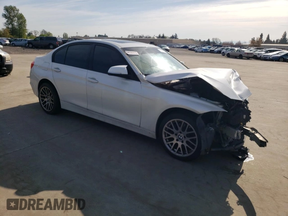 2012 BMW 3 Series 328i with VIN WBA3C1C5XCA696847, listed as a Copart auction lot 53005425 with 143,725 mi miles and Salvage title. Bid and sale history available at DreamBid. Image 4.