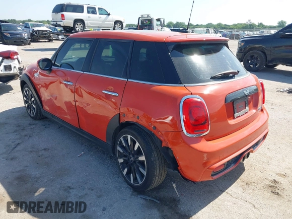2019 MINI Hardtop 4 Door Cooper S with VIN WMWXU3C57K2B64946, listed as a IAAI auction lot 42240647 with 87,704 mi miles and . Bid and sale history available at DreamBid. Image 3.