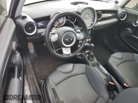 2009 MINI Hardtop S with VIN WMWMF73569TW84934, listed as a Copart auction lot 51344975 with 123,929 mi miles and Salvage title. Bid and sale history available at DreamBid. Image 8.