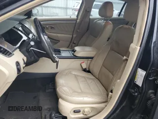 2015 Ford Taurus SEL with VIN 1FAHP2E94FG137935, listed as a Copart auction lot 80921824 with 172,324 mi miles and Salvage Title. Bid and sale history available at DreamBid. Image 7.