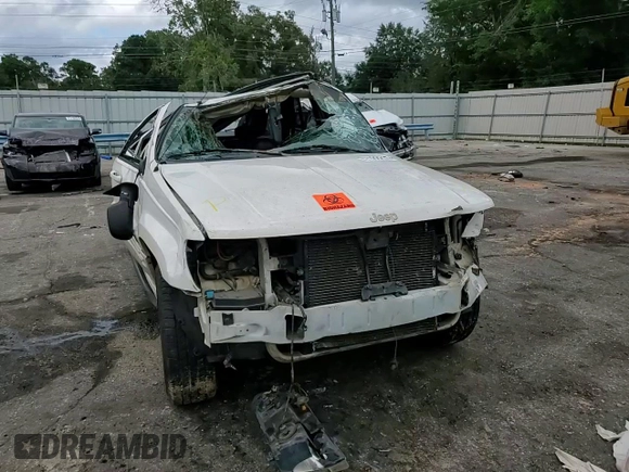 1999 Jeep Grand Cherokee Limited with VIN 1J4G268S2XC756532, listed as a Copart auction lot 71222174 with 279,300 mi miles and Salvage title. Bid and sale history available at DreamBid. Image 12.