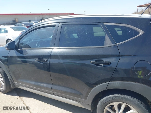 2017 Hyundai Tucson Value with VIN KM8J33A28HU302472, listed as a IAAI auction lot 41717598 with 126,438 mi miles. Bid and sale history available at carsss.com. Image 14.