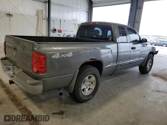 2005 Dodge Dakota SLT с VIN 1D7HW42N95S131964, выставлен на аукционе Copart как лот 53836925 с пробегом 117 094 миль миль и Списание • Salvage title. История ставок и продаж доступна на DreamBid. Изображение 3.