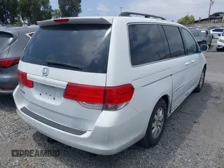 2010 Honda Odyssey EX with VIN 5FNRL3H5XAB060547, listed as a IAAI auction lot 42749876 with 228,522 mi miles and . Bid and sale history available at DreamBid. Image 4.