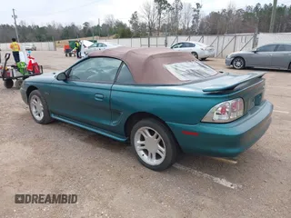 1996 Ford Mustang GT with VIN 1FALP45X7TF129303, listed as a IAAI auction lot 41698238 with 130,181 mi miles. Bid and sale history available at carsss.com. Image 3.