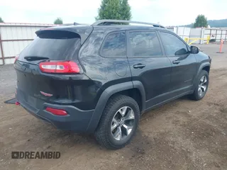 2016 Jeep Cherokee Trailhawk with VIN 1C4PJMBS4GW169267, listed as a IAAI auction lot 42597291 with 79,258 mi miles and . Bid and sale history available at DreamBid. Image 4.