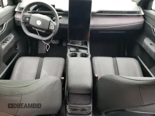 2023 Fisker Ocean One z VIN VCF1ZBU22PG002044, wystawiony jako Copart lot #84522334 z przebiegiem Nie podano mil oraz Szkody całkowita. Historia ofert i sprzedaży dostępna na DreamBid. Obrazek 8.