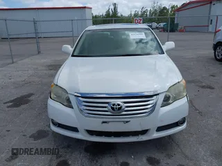 2009 Toyota Avalon XL with VIN 4T1BK36BX9U326841, listed as a IAAI auction lot 42156100 with 166,999 mi miles and . Bid and sale history available at DreamBid. Image 12.