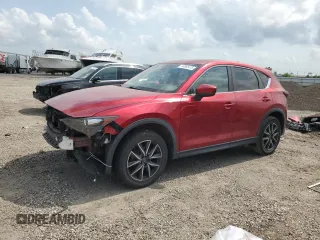 2018 Mazda CX-5 Touring with VIN JM3KFACM8J1469772, listed as a Copart auction lot 54863415 with 97,592 mi miles and Salvage Title. Bid and sale history available at carsss.com. Image 1.