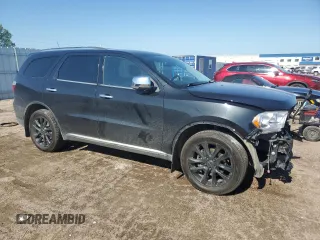 2013 Dodge Durango Crew with VIN 1C4RDJDG5DC701016, listed as a Copart auction lot 60832385 with 236,719 mi miles and Salvage title. Bid and sale history available at DreamBid. Image 4.