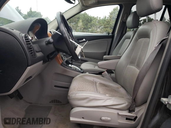 2006 Saturn VUE z VIN 5GZCZ53426S889605, wystawiony jako Copart lot #53852245 z przebiegiem 77 891 mil mil oraz Szkody całkowita. Historia ofert i sprzedaży dostępna na DreamBid. Obrazek 7.