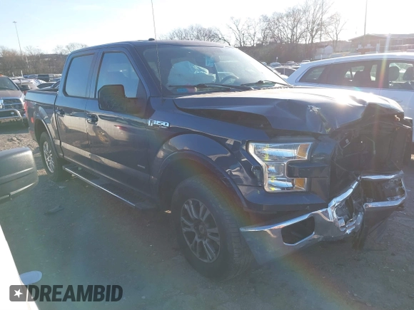 2015 Ford F-150 XLT with VIN 1FTEW1EP7FFD00589, listed as a IAAI auction lot 41677203 with 156,064 mi miles. Bid and sale history available at carsss.com. Image 1.