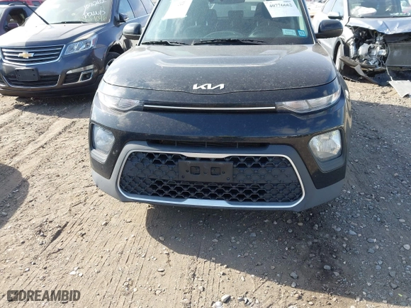 2022 Kia Soul LX with VIN KNDJ23AU0N7163473, listed as a IAAI auction lot 40776662 with 56,477 mi miles. Bid and sale history available at carsss.com. Image 12.