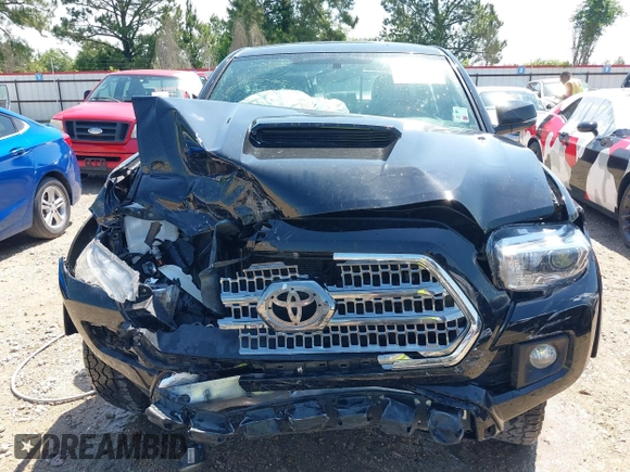 2017 Toyota Tacoma SR5 z VIN 5TFAZ5CNXHX048879, wystawiony jako IAAI lot #42157227 z przebiegiem 119 932 mil mil oraz . Historia ofert i sprzedaży dostępna na DreamBid. Obrazek 12.
