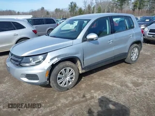 2012 Volkswagen Tiguan with VIN WVGCV7AX6CW589605, listed as a IAAI auction lot 41916090 with 123,223 mi miles and . Bid and sale history available at DreamBid. Image 2.