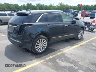 2017 Cadillac XT5 Platinum AWD z VIN 1GYKNFRS9HZ125677, wystawiony jako IAAI lot #42366784 z przebiegiem 152 116 mil mil oraz . Historia ofert i sprzedaży dostępna na DreamBid. Obrazek 4.