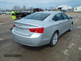 2016 Chevrolet Impala LT with VIN 2G1115S35G9185497, listed as a IAAI auction lot 41997442 with 154,510 mi miles and . Bid and sale history available at DreamBid. Image 4.