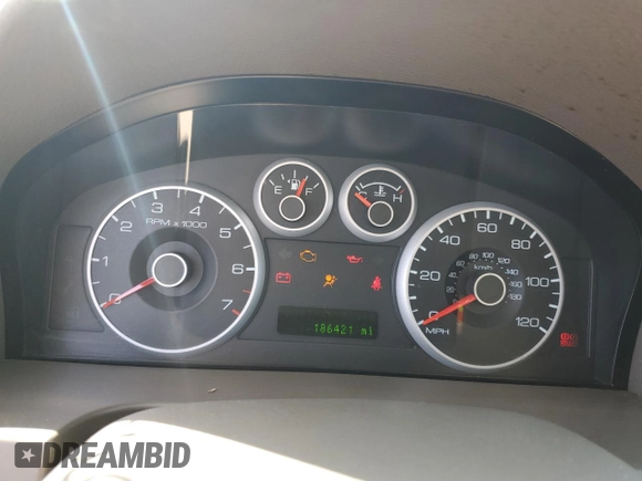 2007 Ford Fusion SE with VIN 3FAHP07137R209505, listed as a Copart auction lot 51517135 with 186,421 mi miles and Salvage Title. Bid and sale history available at DreamBid. Image 9.