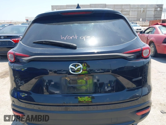 2021 Mazda CX-9 Touring with VIN JM3TCBCY8M0514905, listed as a IAAI auction lot 42385627 with 72,610 mi miles and . Bid and sale history available at DreamBid. Image 16.