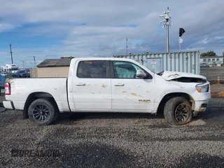 2020 Ram 1500 Big Horn z VIN 1C6SRFFT7LN128110, wystawiony jako IAAI lot #41885725 z przebiegiem 124 043 mil mil oraz . Historia ofert i sprzedaży dostępna na DreamBid. Obrazek 14.