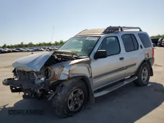 2004 Nissan Xterra XE with VIN 5N1ED28T24C668127, listed as a Copart auction lot 60123775 with 162,083 mi miles and Salvage title. Bid and sale history available at DreamBid. Image 1.