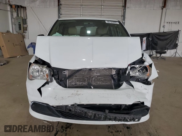 2015 Dodge Grand Caravan SE with VIN 2C4RDGBG0FR557536, listed as a Copart auction lot 48735265 with 81,076 mi miles and Salvage Title. Bid and sale history available at DreamBid. Image 5.