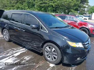 2014 Honda Odyssey Touring with VIN 5FNRL5H93EB008620, listed as a IAAI auction lot 42645066 with 120,116 mi miles and . Bid and sale history available at DreamBid. Image 1.