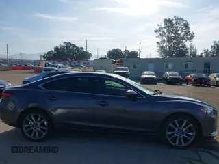 2015 Mazda 6 i Grand Touring with VIN JM1GJ1W55F1220578, listed as a IAAI auction lot 42076034 with 77,904 mi miles and . Bid and sale history available at carsss.com. Image 13.