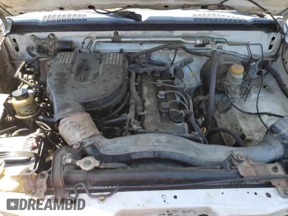 1999 Nissan Frontier XE with VIN 1N6DD26S3XC326231, listed as a Copart auction lot 51710615 with 228,174 mi miles and Salvage title. Bid and sale history available at DreamBid. Image 11.