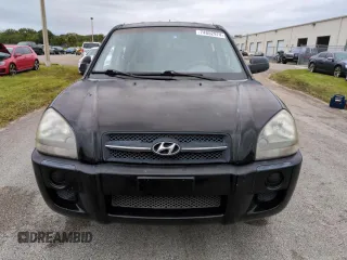 2005 Hyundai Tucson GL with VIN KM8JM12BX5U071182, listed as a Copart auction lot 74852974 with 74,235 mi miles and Salvage Title. Bid and sale history available at carsss.com. Image 5.
