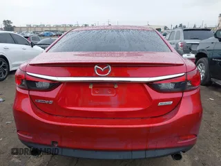 2016 Mazda 6 i Sport with VIN JM1GJ1U54G1457194, listed as a IAAI auction lot 41725704 with 109,628 mi miles and . Bid and sale history available at DreamBid. Image 16.