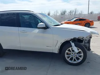 2016 BMW X5 xDrive40e with VIN 5UXKT0C51G0S76171, listed as a IAAI auction lot 41586244 with 85,517 mi miles and . Bid and sale history available at DreamBid. Image 14.