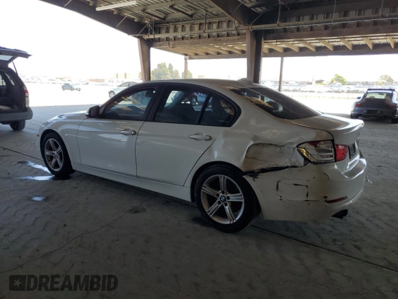 2013 BMW 3 Series 328i with VIN WBA3C1G56DNR44970, listed as a Copart auction lot 62781465 with 96,935 mi miles and Salvage title. Bid and sale history available at DreamBid. Image 2.