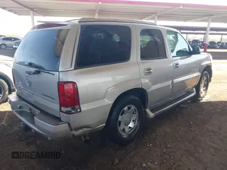 2005 Cadillac Escalade z VIN 1GYEC63T65R164307, wystawiony jako IAAI lot #42015617 z przebiegiem 173 270 mil mil oraz . Historia ofert i sprzedaży dostępna na DreamBid. Obrazek 4.