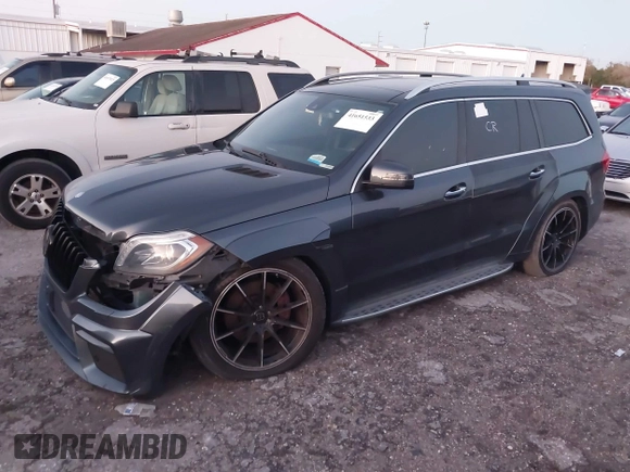 2014 Mercedes-Benz GL-Class GL 550 with VIN 4JGDF7DE9EA329761, listed as a IAAI auction lot 41651533 with 113,056 mi miles. Bid and sale history available at carsss.com. Image 20.