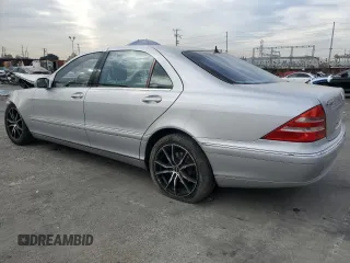 2002 Mercedes-Benz S-Class 4.3L with VIN WDBNG70J62A257551, listed as a Copart auction lot 84096614 with 113,860 mi miles and Salvage Title. Bid and sale history available at carsss.com. Image 2.