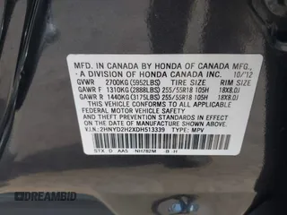 2013 Acura MDX with VIN 2HNYD2H2XDH513339, listed as a IAAI auction lot 41757640 with 142,902 mi miles. Bid and sale history available at carsss.com. Image 9.