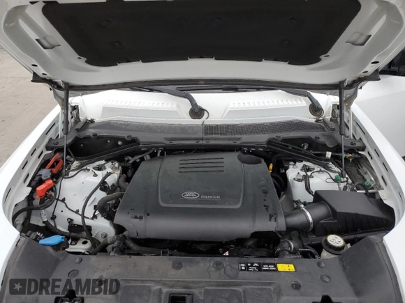 2021 Land Rover Defender S with VIN SALEJ7RX9M2038129, listed as a Copart auction lot 83840574 with 88,105 mi miles and Salvage title. Bid and sale history available at DreamBid. Image 12.