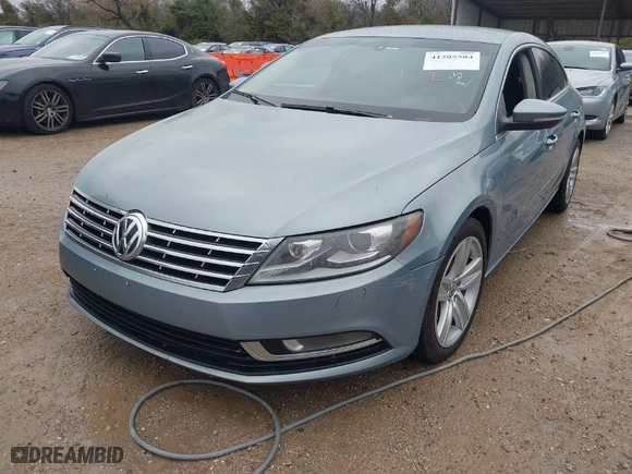 2013 Volkswagen CC Sport with VIN WVWBN7AN7DE503417, listed as a IAAI auction lot 41205584 with 185,437 mi miles. Bid and sale history available at carsss.com. Image 2.