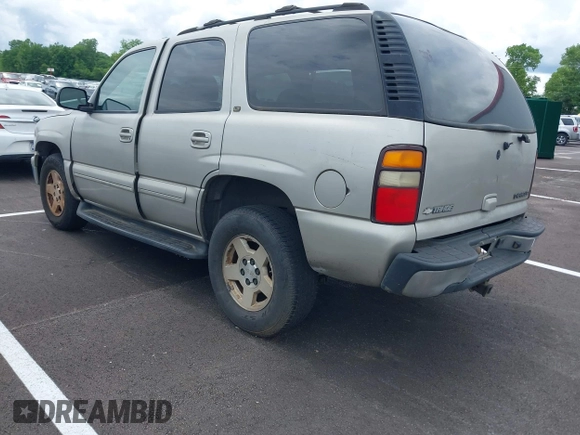 2004 Chevrolet Tahoe LS z VIN 1GNEC13Z84R140433, wystawiony jako IAAI lot #42352311 z przebiegiem Nie podano mil oraz . Historia ofert i sprzedaży dostępna na DreamBid. Obrazek 3.