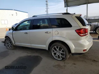 2014 Dodge Journey Limited with VIN 3C4PDCDG8ET170709, listed as a Copart auction lot 84538724 with 147,377 mi miles and Salvage Title. Bid and sale history available at DreamBid. Image 2.