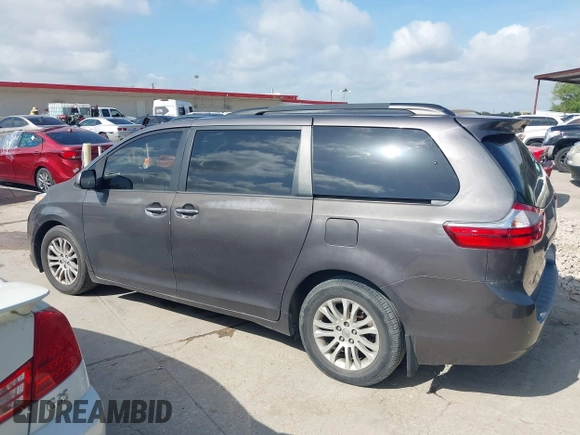 2015 Toyota Sienna XLE with VIN 5TDYK3DC6FS542504, listed as a IAAI auction lot 42569992 with 113,004 mi miles and . Bid and sale history available at DreamBid. Image 14.
