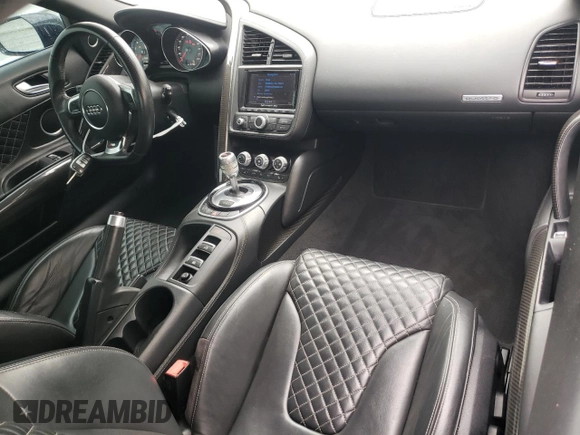2014 Audi R8 z VIN WUASUAFG4EN001365, wystawiony jako Copart lot #58440864 z przebiegiem 67 980 mil mil oraz Szkoda całkowita • Salvage title. Historia ofert i sprzedaży dostępna na DreamBid. Obrazek 8.