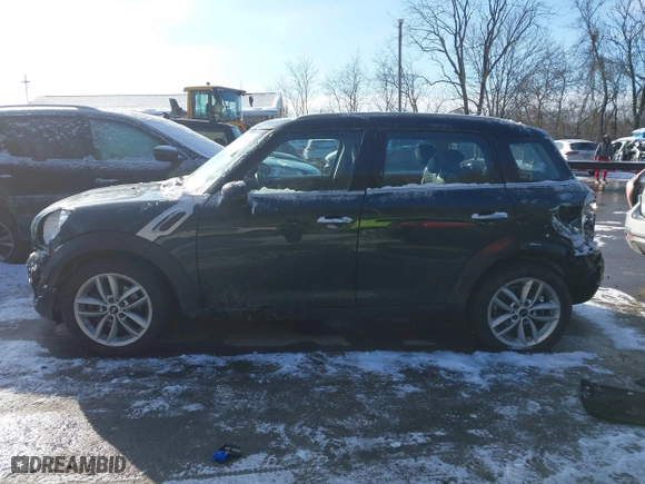 2013 MINI Cooper Countryman with VIN WMWZB3C53DWM08700, listed as a IAAI auction lot 41402093 with 71,109 mi miles. Bid and sale history available at carsss.com. Image 15.