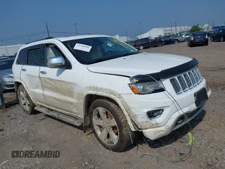2015 Jeep Grand Cherokee Overland with VIN 1C4RJFCGXFC880096, listed as a IAAI auction lot 42706085 with 74,044 mi miles and . Bid and sale history available at DreamBid. Image 1.