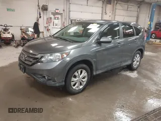 2014 Honda CR-V EX with VIN 2HKRM4H50EH723876, listed as a IAAI auction lot 41464608 with 130,502 mi miles. Bid and sale history available at carsss.com. Image 2.
