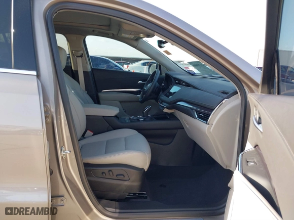 2023 Cadillac XT4 FWD Luxury with VIN 1GYAZAR41PF149914, listed as a IAAI auction lot 41709996 with 4,345 mi miles. Bid and sale history available at carsss.com. Image 5.
