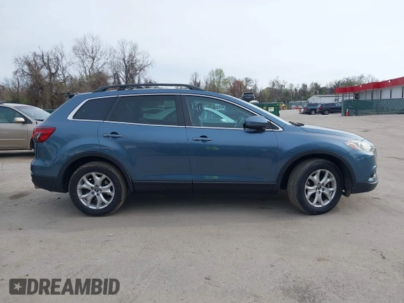 2015 Mazda CX-9 Touring with VIN JM3TB3CVXF0460959, listed as a IAAI auction lot 41940912 with 166,674 mi miles and . Bid and sale history available at DreamBid. Image 13.